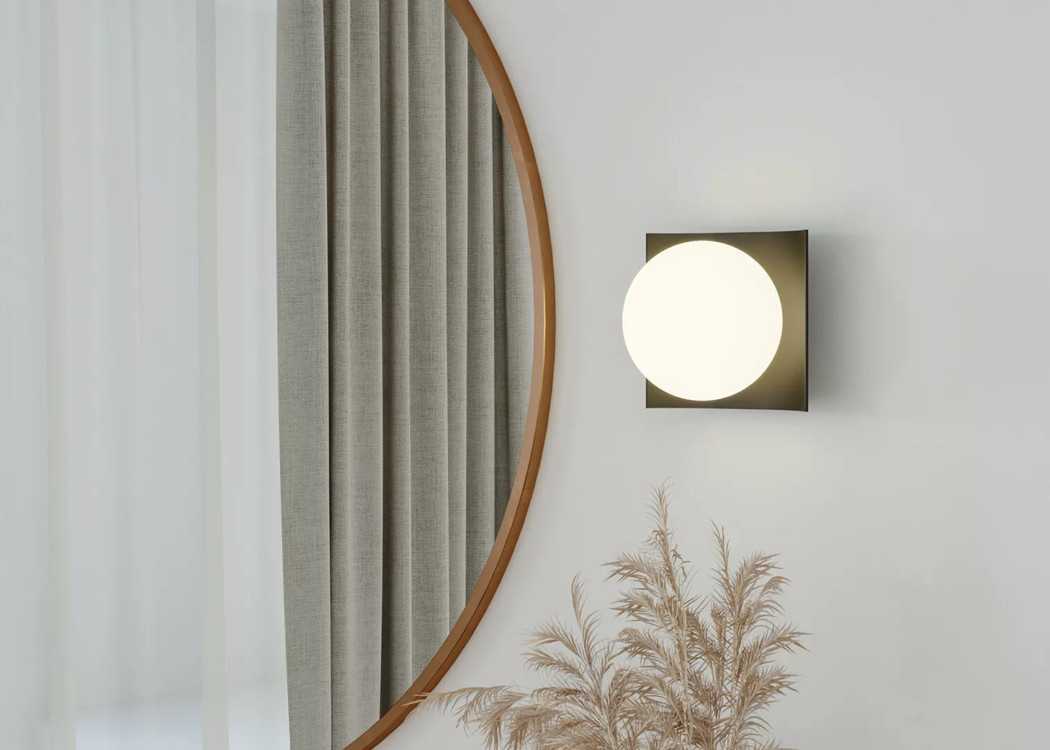 Minimalist interior with circular wall light and oval mirror.