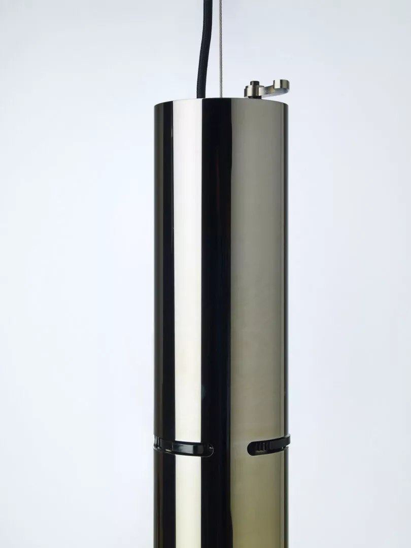 Sleek hanging cylindrical modern pendant light