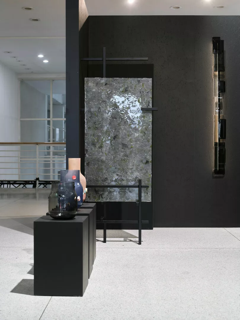 Modern indoor waterfall display with minimalist decor.