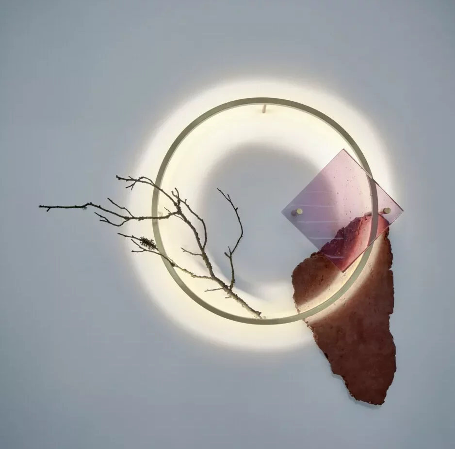 Abstract art with circle light, branch, and geometric shapes.